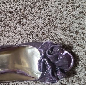 sparkly purple pair of high heels